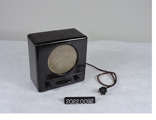 A Volksempfänger, the Nazi-era German people's radio receiver, against a museum backdrop