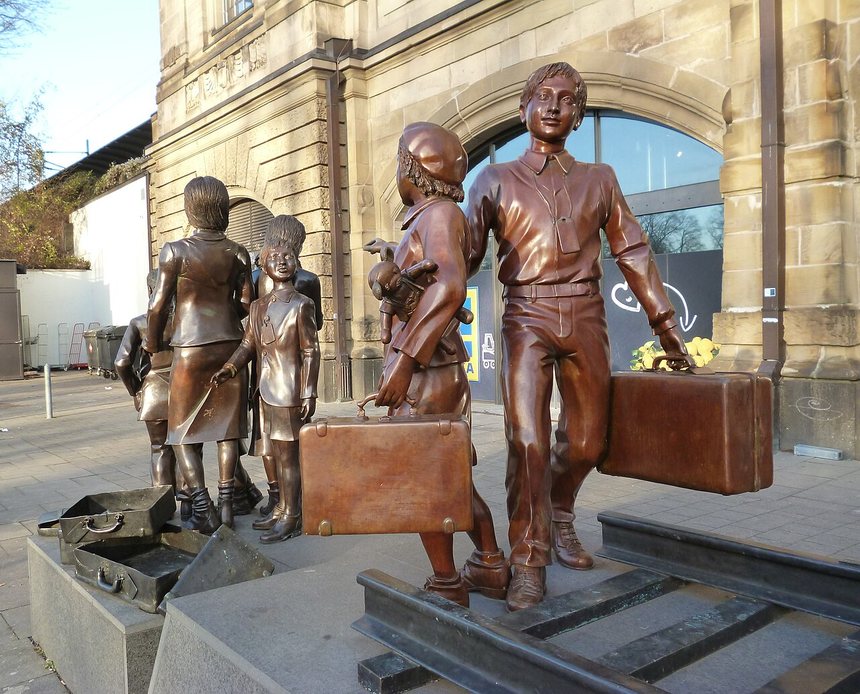 The Last Goodbye, a bronze sculpture of children with suitcases on railway tracks at Hamburg&rsquo;s Dammtor station.