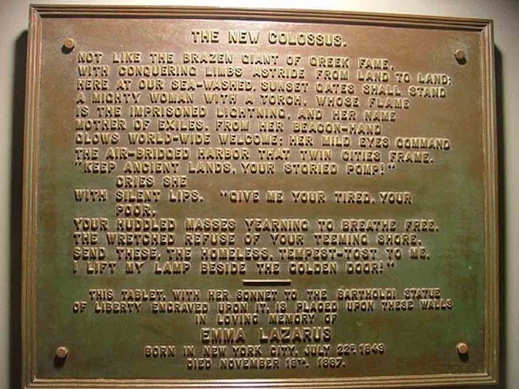 The bronze plaque inside the Statue of Liberty's pedestal bearing the full text of The New Colossus.