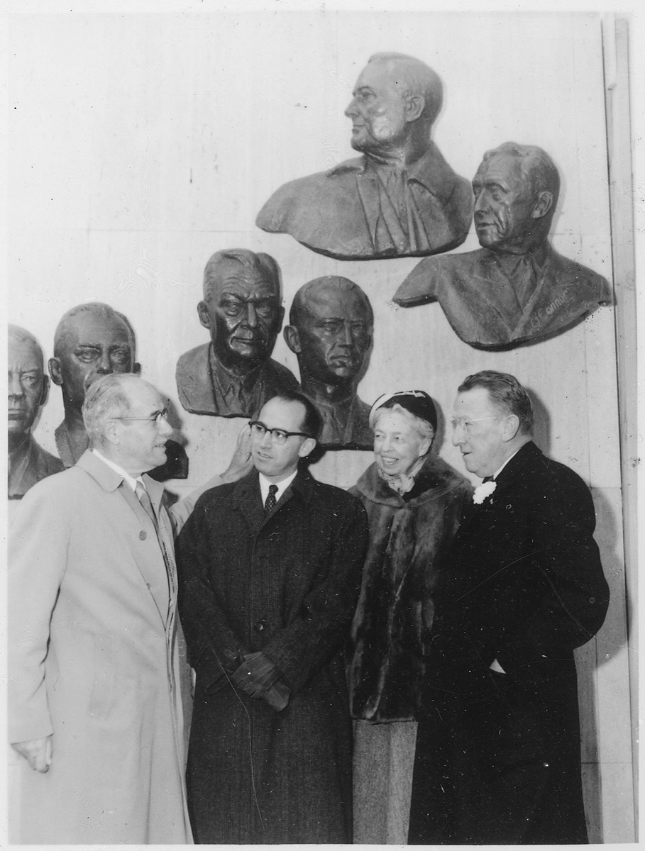 Eleanor Roosevelt, Jonas Salk, and Basil O'Connor standing together at the Infantile Paralysis Hall of Fame at Warm Springs, Georgia.